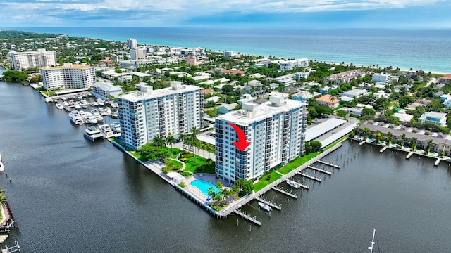 birds eye view of property featuring a water view