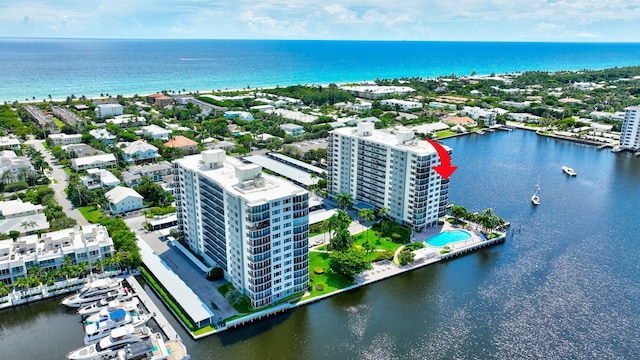 drone / aerial view with a water view