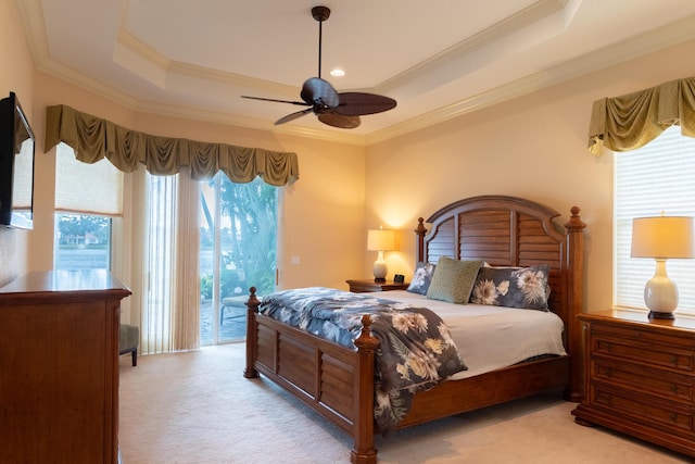 bedroom featuring access to exterior, ceiling fan, and multiple windows