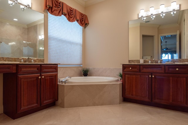 bathroom featuring vanity, separate shower and tub, ornamental molding, and a wealth of natural light