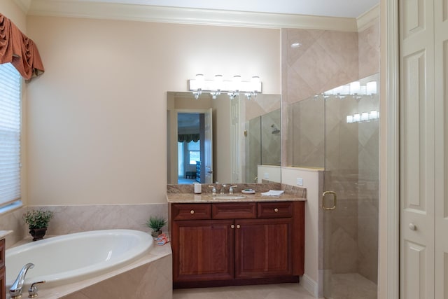 bathroom with vanity, a wealth of natural light, plus walk in shower, and ornamental molding