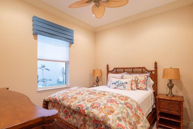 bedroom featuring ceiling fan and ornamental molding