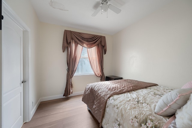 bedroom featuring ceiling fan and light hardwood / wood-style floors