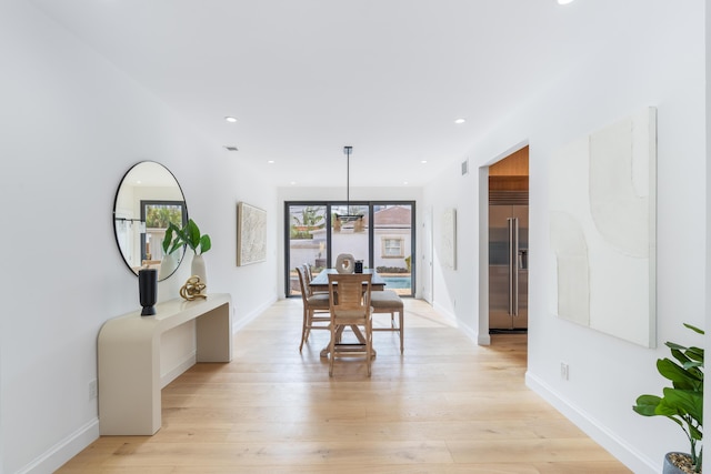 dining room featuring light hardwood / wood-style floors