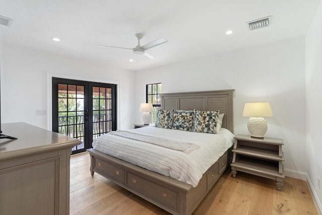 bedroom with ceiling fan, access to outside, french doors, and light wood-type flooring