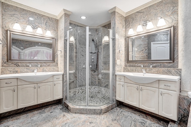 bathroom with vanity, crown molding, and walk in shower