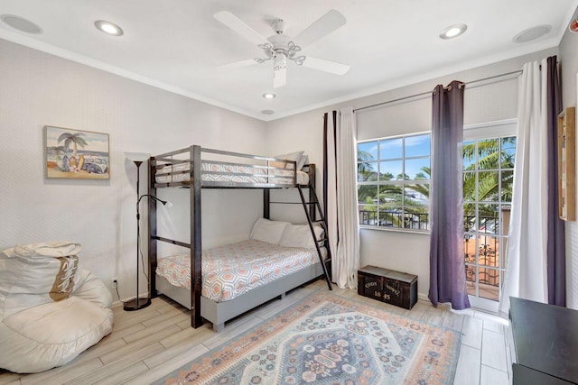 bedroom featuring ornamental molding and ceiling fan