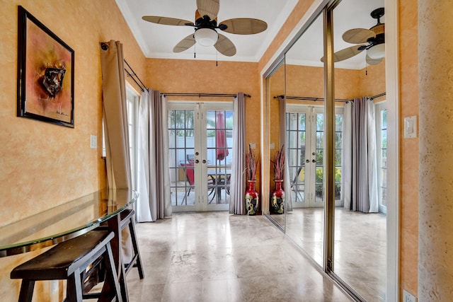 interior space with ceiling fan, french doors, and crown molding