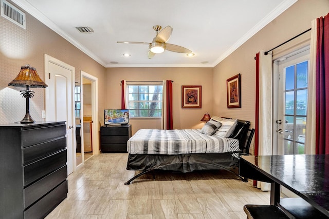 bedroom featuring ceiling fan and crown molding