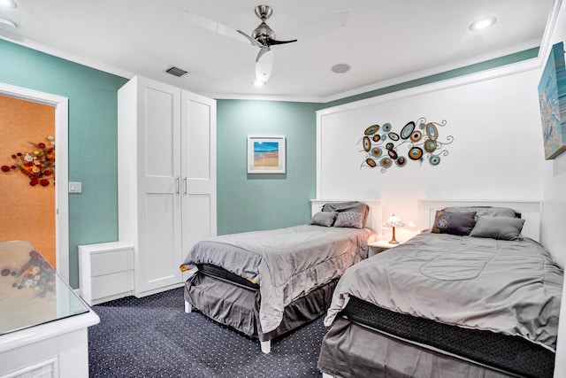 carpeted bedroom featuring ceiling fan