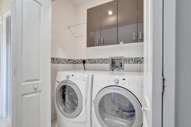 laundry area with washer and dryer