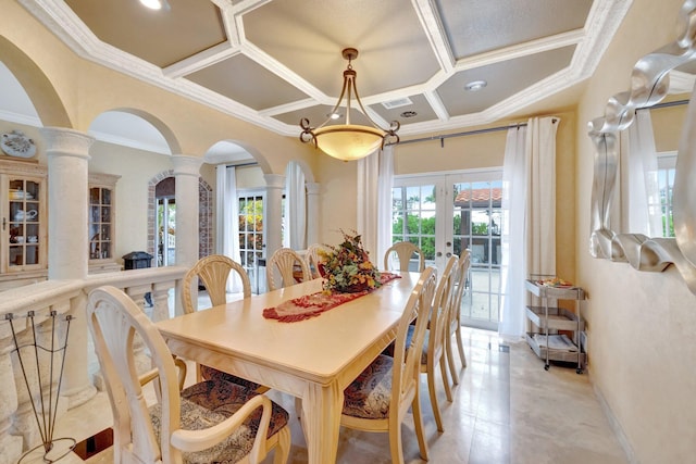 dining space featuring coffered ceiling, french doors, and ornamental molding