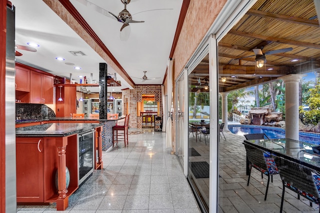 kitchen with beverage cooler and ceiling fan