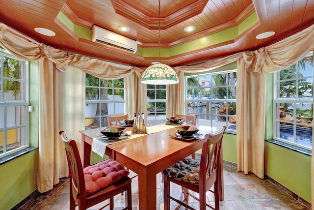 dining space featuring an AC wall unit, crown molding, a tray ceiling, and wood ceiling