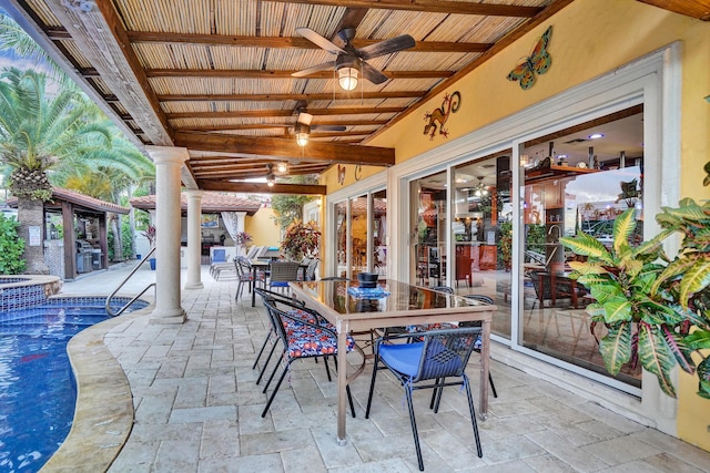 view of patio featuring ceiling fan