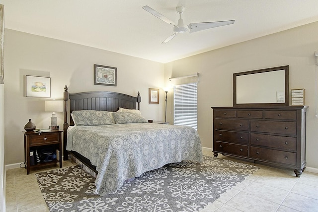 tiled bedroom with ceiling fan