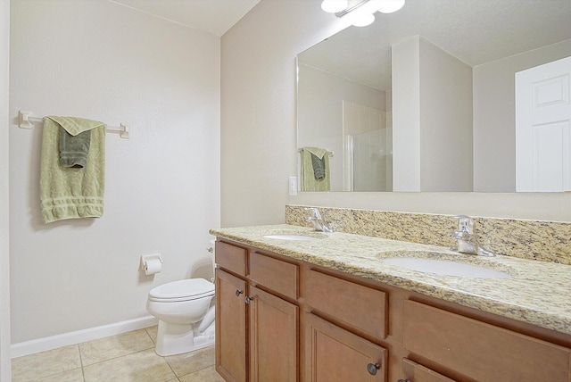 bathroom with vanity, a shower with door, tile patterned floors, toilet, and a textured ceiling