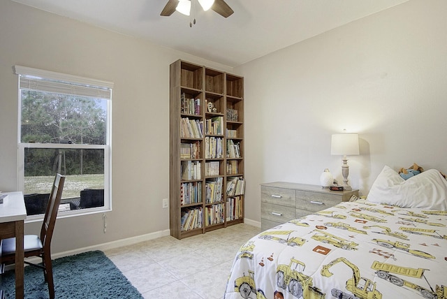 bedroom with light tile patterned floors and ceiling fan