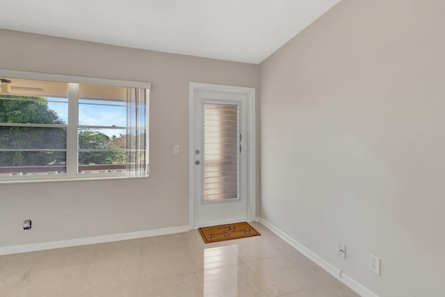 doorway featuring light tile patterned floors