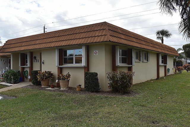 view of front of house with a front yard