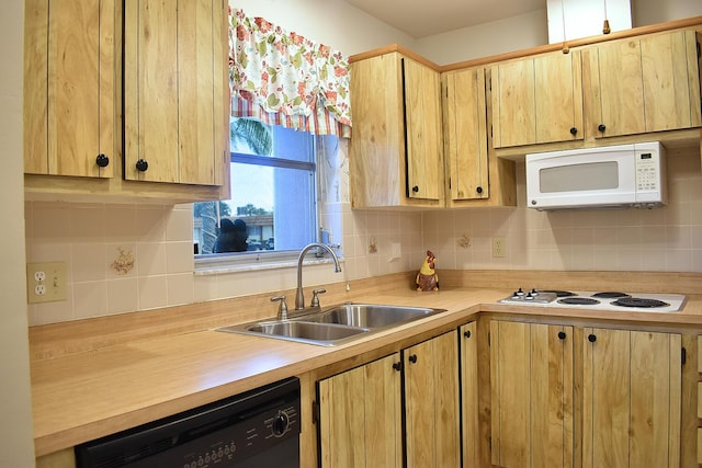 kitchen with backsplash, light brown cabinets, white appliances, and sink