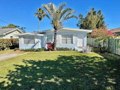 ranch-style home with a front yard