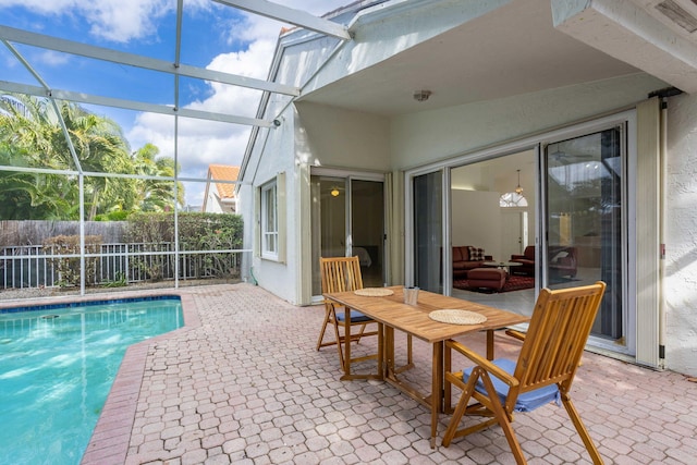 sunroom / solarium featuring a pool