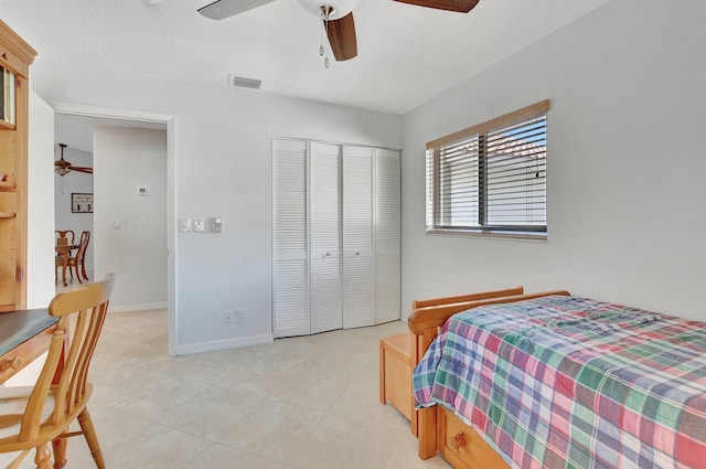 bedroom with a closet and ceiling fan