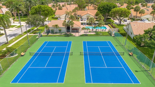 view of tennis court with basketball court