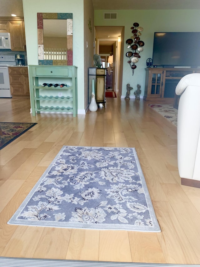 living room with hardwood / wood-style flooring