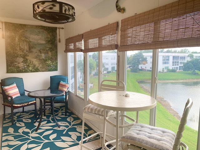 sunroom with a water view