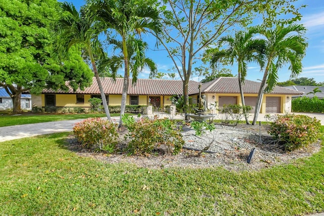 single story home with a front yard