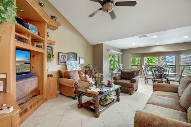 living room featuring light tile patterned floors, ceiling fan, and lofted ceiling