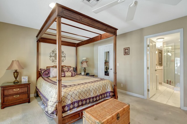 carpeted bedroom featuring ensuite bathroom and ceiling fan