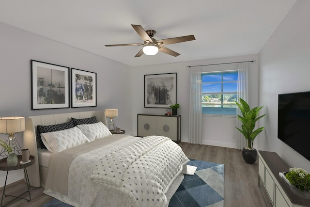 bedroom with hardwood / wood-style flooring and ceiling fan