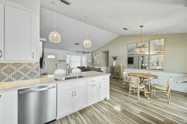 kitchen featuring ceiling fan, dishwasher, hanging light fixtures, light hardwood / wood-style flooring, and white cabinets