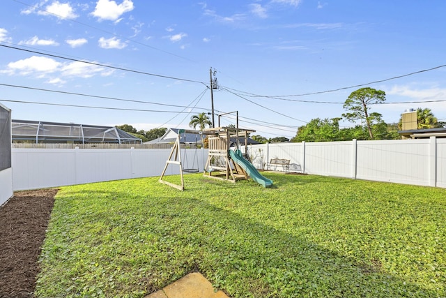 view of yard with a playground