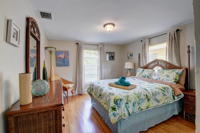 bedroom featuring hardwood / wood-style flooring