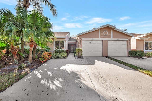 ranch-style home with a garage