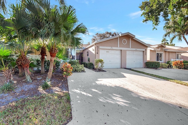 view of front of property with a garage