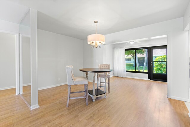 unfurnished living room featuring ceiling fan and light colored carpet