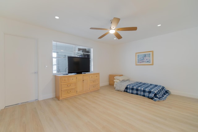 bedroom featuring ceiling fan and light hardwood / wood-style floors