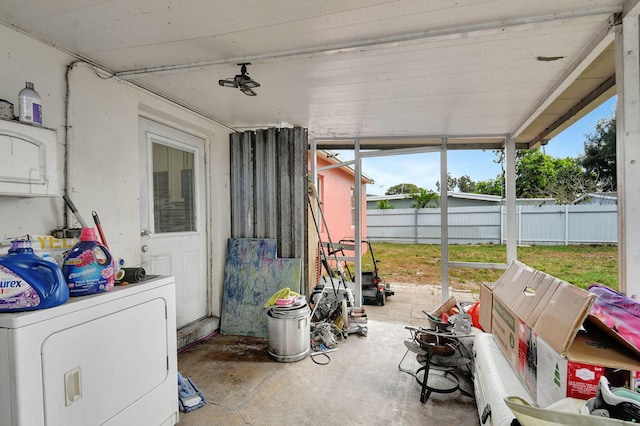 sunroom with washer / clothes dryer