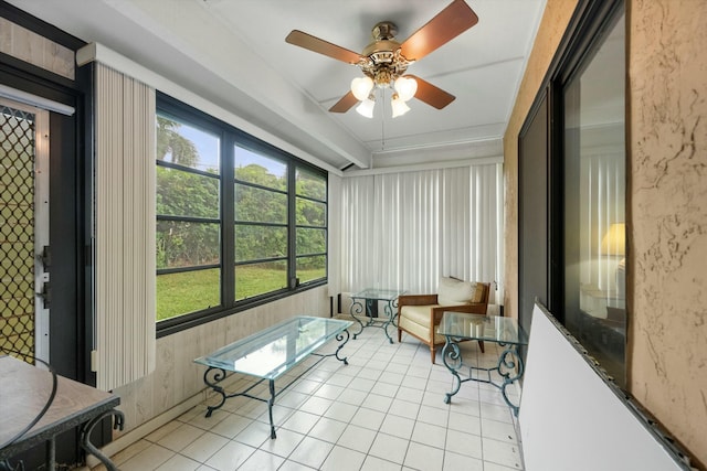 sunroom / solarium with ceiling fan and a healthy amount of sunlight