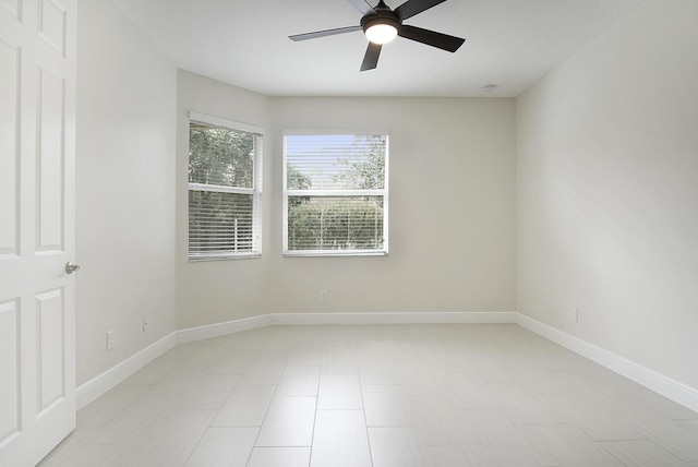 spare room featuring ceiling fan