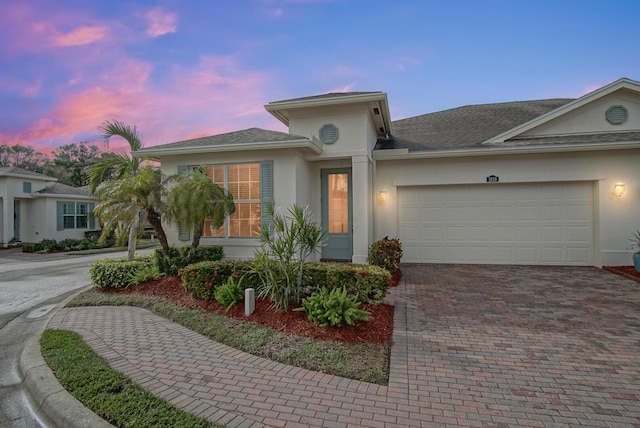 view of front of house with a garage