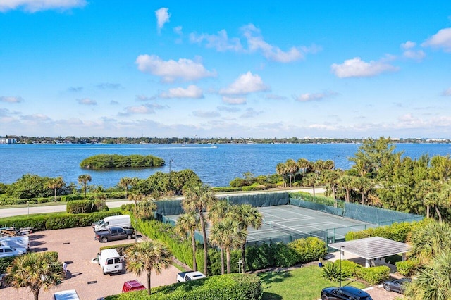 birds eye view of property with a water view