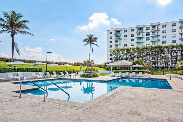 view of swimming pool featuring a patio area