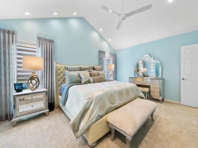 carpeted bedroom featuring high vaulted ceiling and ceiling fan