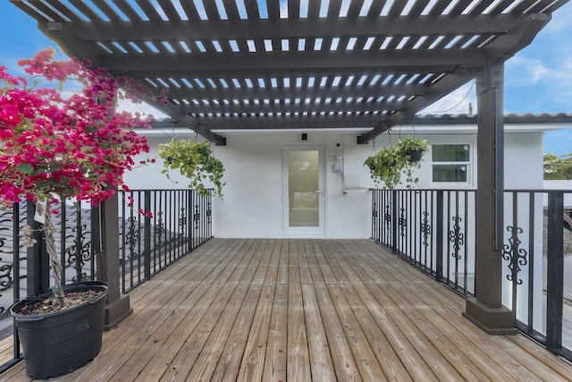 wooden terrace with a pergola